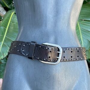 Black leather statement belt with leather, whip, stitching and tiny studs